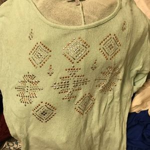 Random shirts and pair of american eagle pants